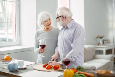 Old couples cooking together